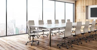Headerbild Inhouse Schulungen: Leerer Besprechungsraum